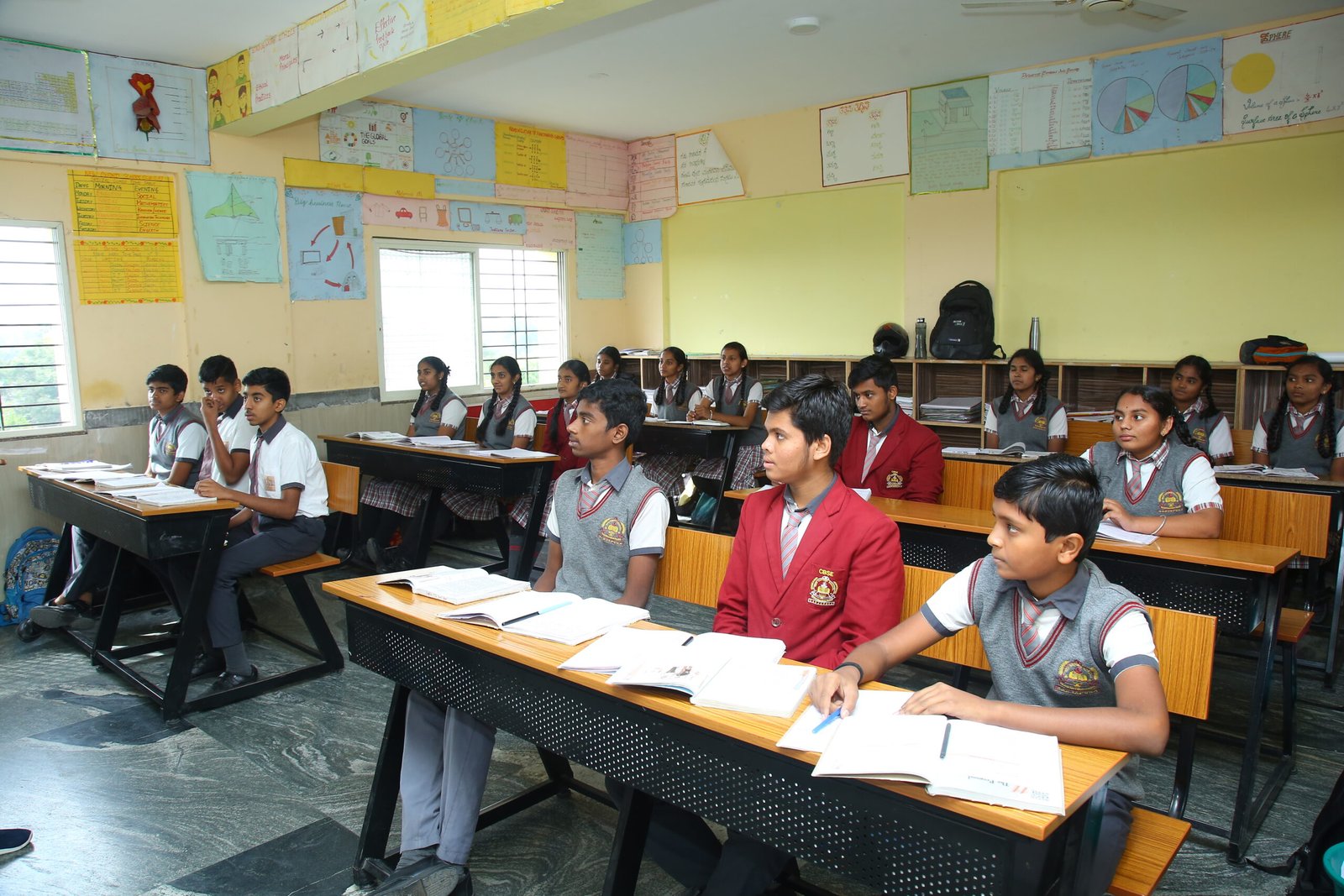 Secondary students in a class discussion