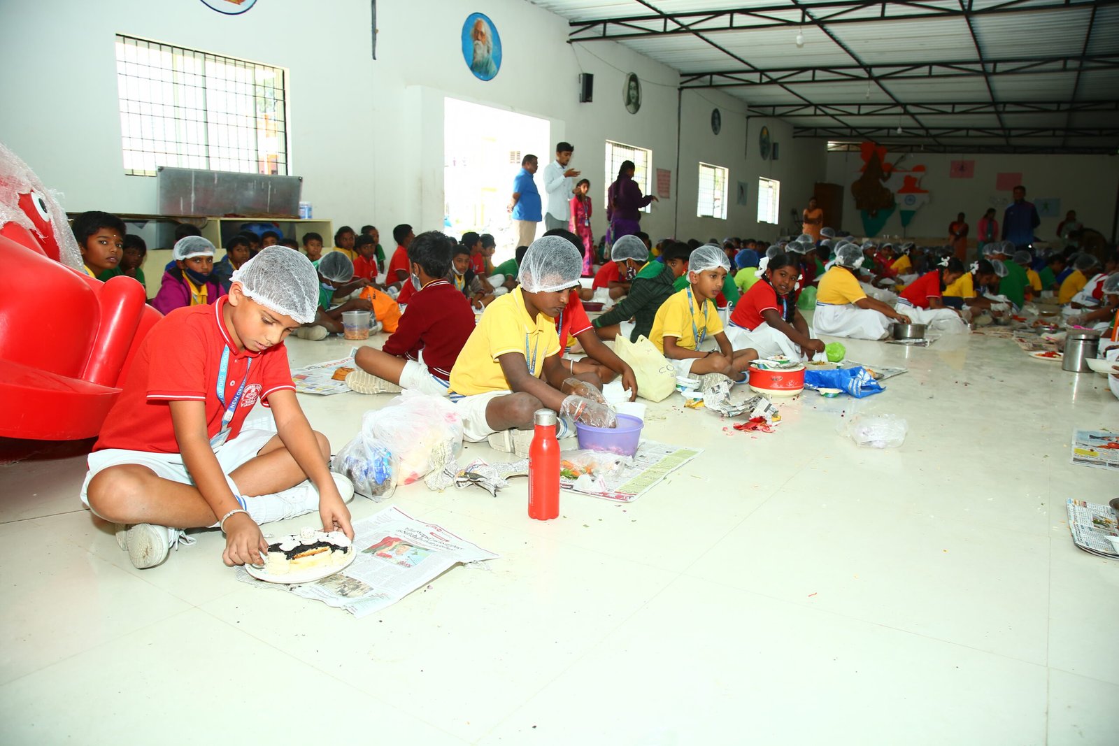 Children doing a group activity in the hall