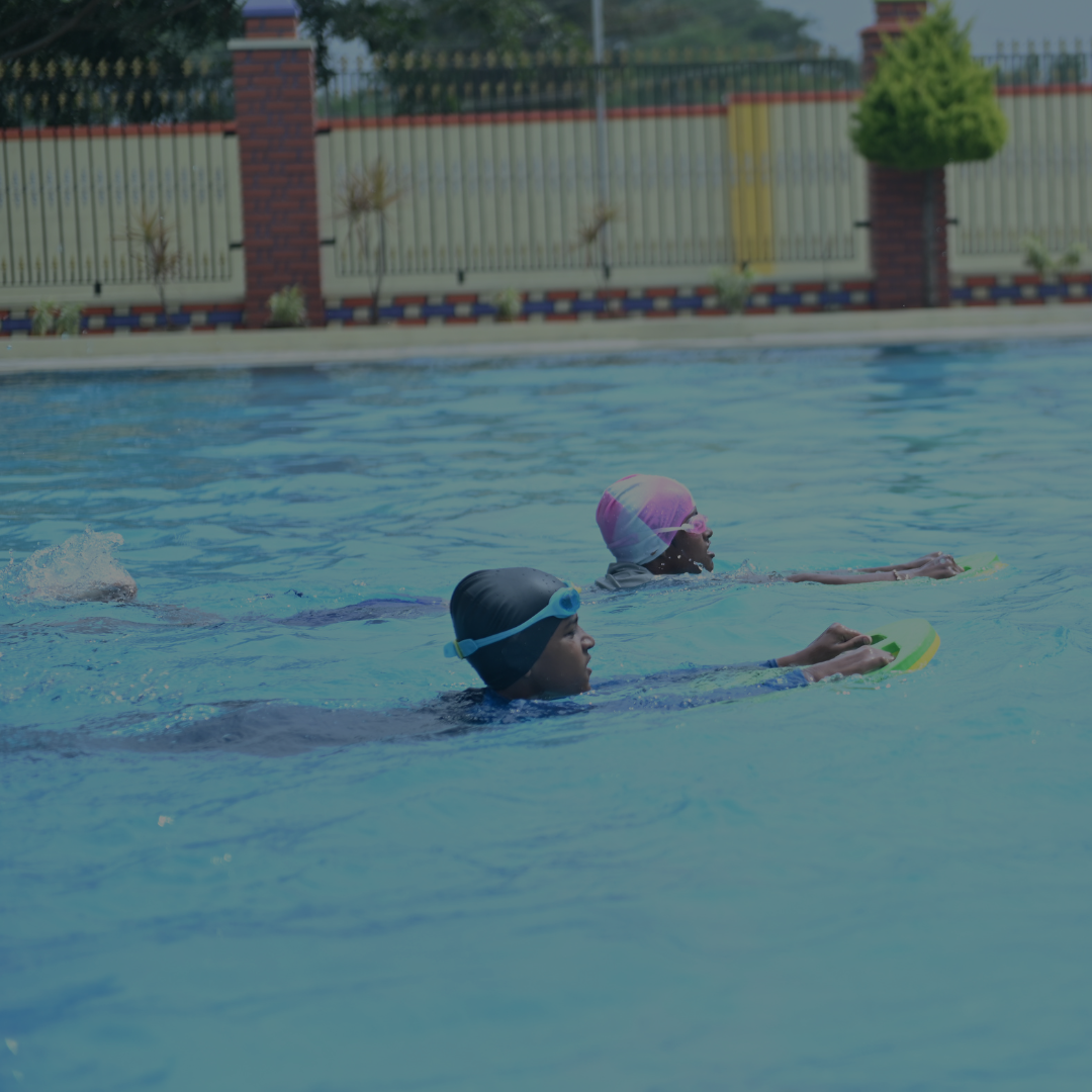 Student swimming in the school pool